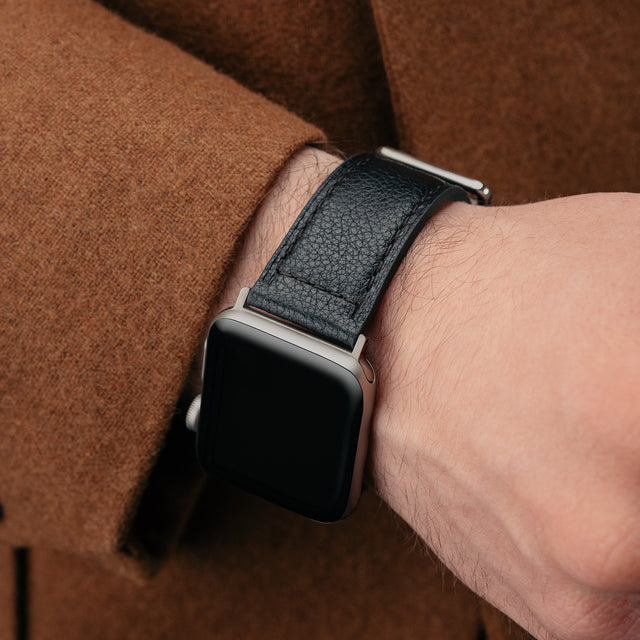 Man wearing the Black with Tan underside Leather Apple Watch Strap