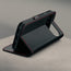Stand function of the Black with Red Stitching Leather Case for the Google Pixel 11 Pro XL