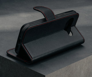 Stand feature of the Black with Red Detail Leather Wallet Case for Google Pixel 9