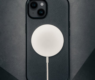 MagSafe charger attached to the Slimline Bumper Case for iPhone 15