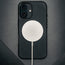 MagSafe charger connected to the Black Leather Slimline Bumper Case for iPhone 16