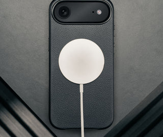 MagSafe charger attached to the Black Leather Bumper Case for iPhone 17 Air