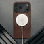 MagSafe charger attached to the Slimline Dark Brown Leather Bumper Case for iPhone 17 Pro