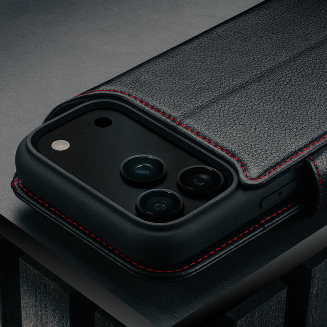 Camera cutout on the Black with Red Detail Leather Detachable Case for iPhone 17 Pro