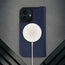 MagSafe charger attached to the Navy Blue Leather Case for iPhone 17
