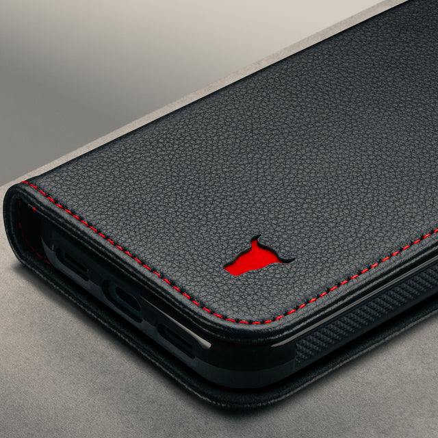 Close up of the Black with Red Stitching Leather Case for the Google Pixel 11