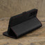 Stand feature of the Black with Red Detail Leather Case for Galaxy A55