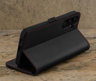 Stand function of the Black with Red Detail Leather Wallet Case for Samsung Galaxy S24 Plus