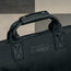 Leather carry handles on the Black Trifold Canvas Suit Carrier / Garment Bag