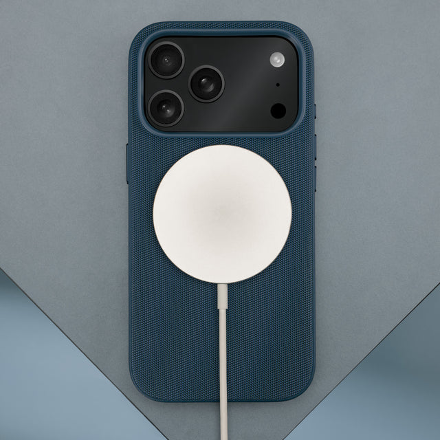 Wireless charger attached to the Blue Woven Fabric Bumper Case for iPhone 17 Pro Max