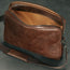 Inner protective flap in the Dark Brown Leather Messenger Bag