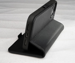 Integrated stand function of the Black Leather Folio Stand Case for iPhone 14